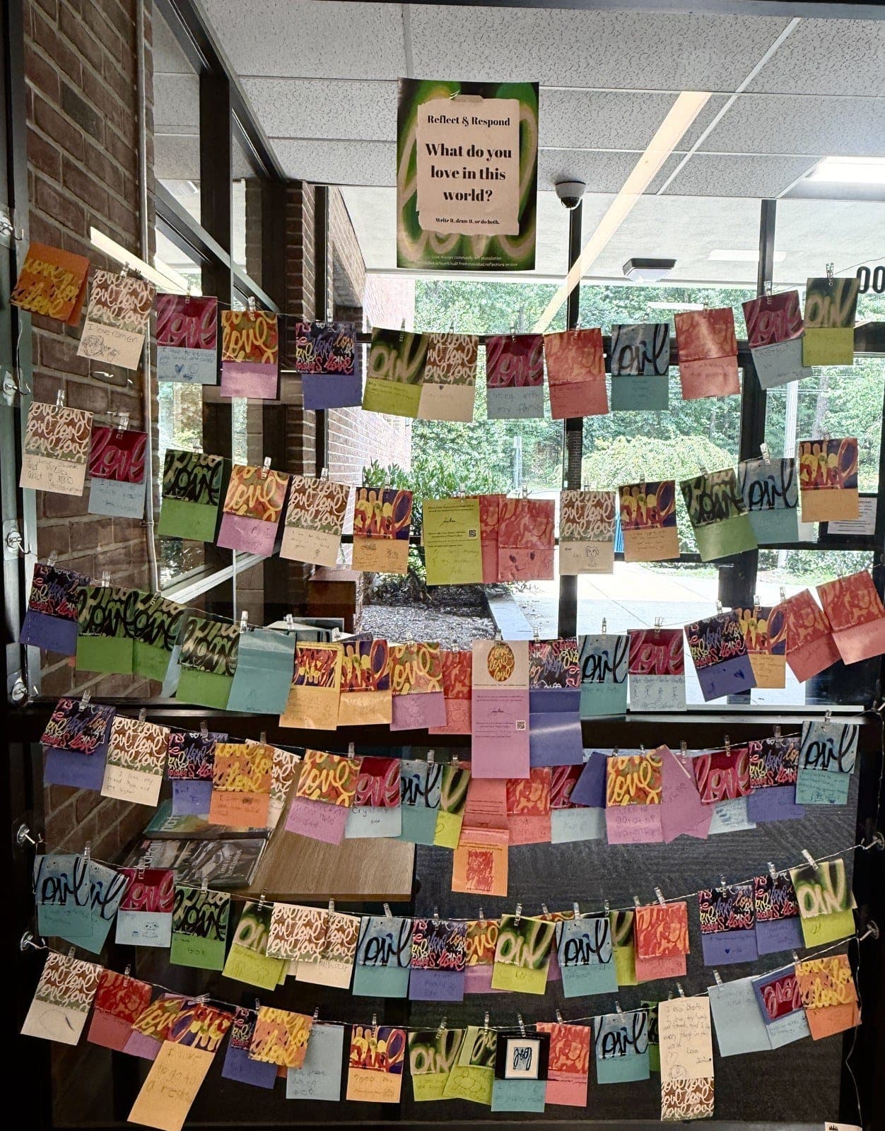 Visitors contributed words and drawings to the Love Always installation at Millburn Free Library.